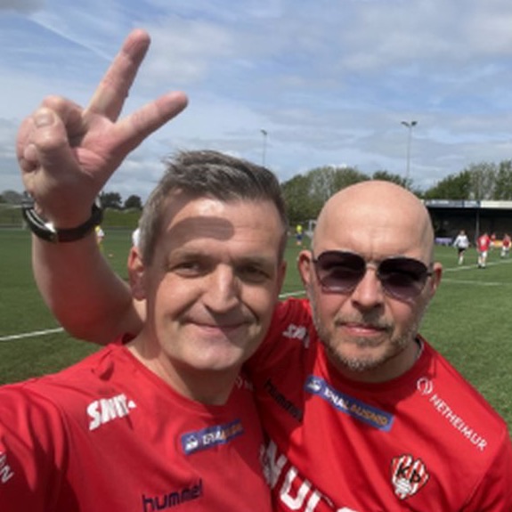 Two teammates taking a selfie at the pitch